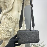 Louis Vuitton Horizon Clutch