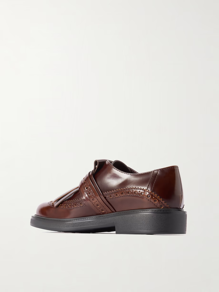 Fringed glossed-leather brogues