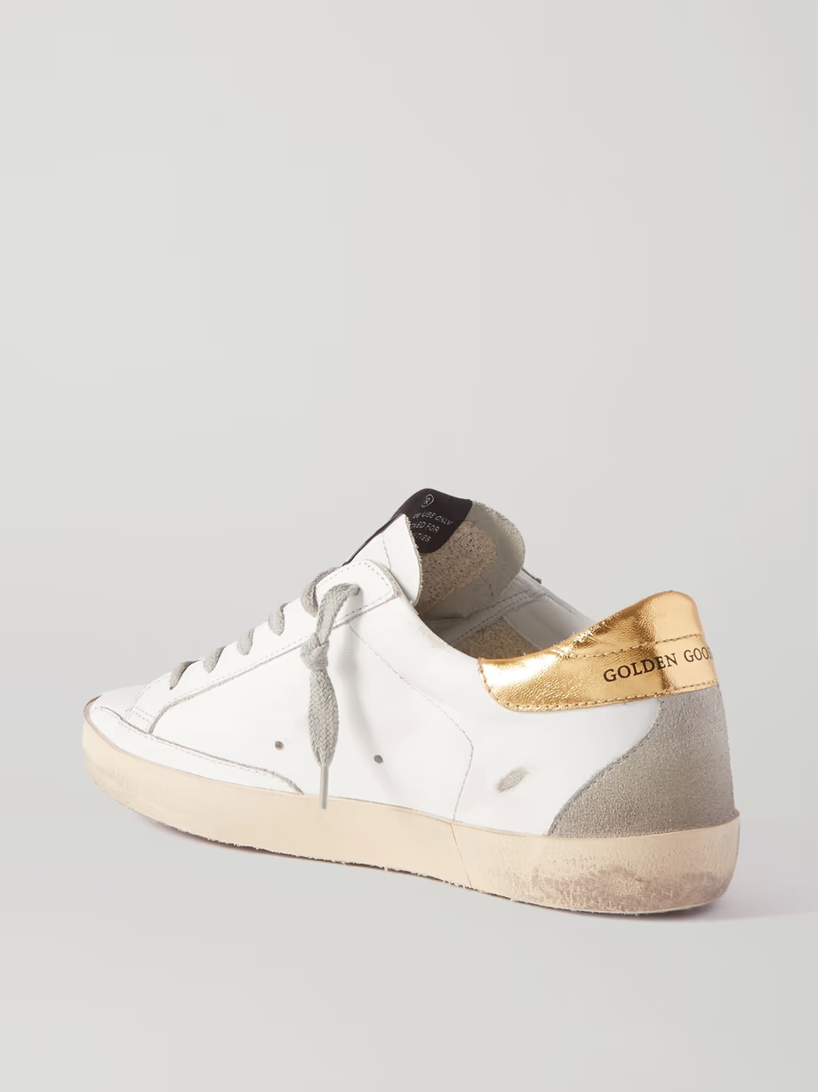 Superstar distressed leather and suede sneakers