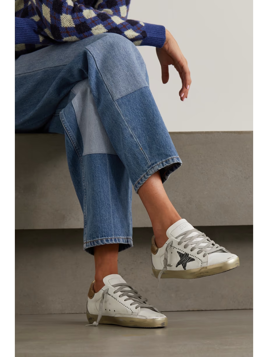 Superstar distressed suede-trimmed printed leather sneakers